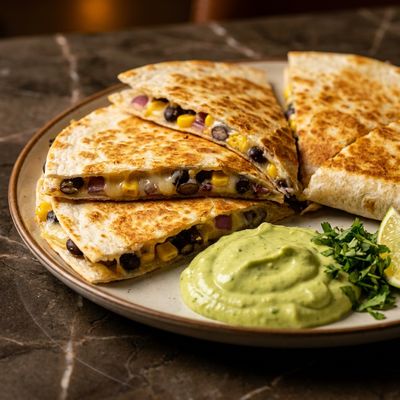 Black Bean and Corn Quesadillas with Avocado Crema