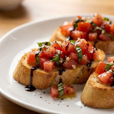 Bruschetta with Balsamic Glaze and Fresh Basil